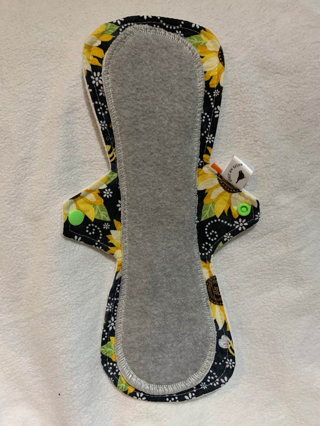 Rounded corners shape exposed core bamboo charcoal fleece